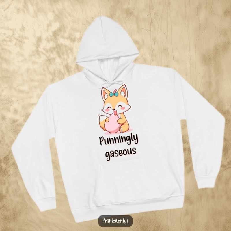 Funny Kawaii Fox Hoodie sticking its tongue out and holding a whoopee cushion, offering cozy comfort and a touch of mischievous prankster humor.