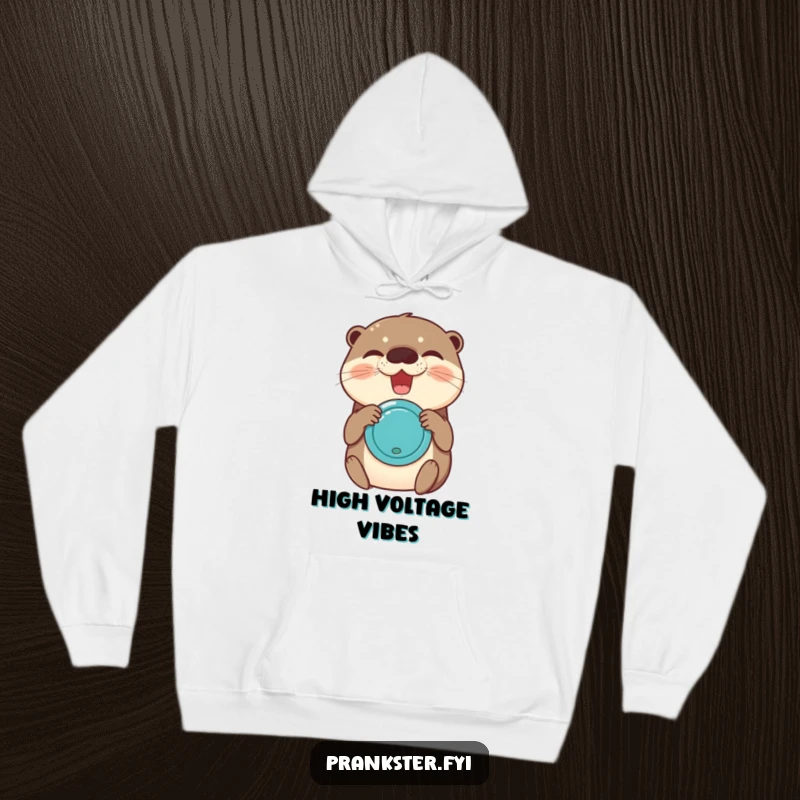 Funny hoodie with a delighted otter holding and squeezing a joy buzzer, expressing intense, contagious amusement.
