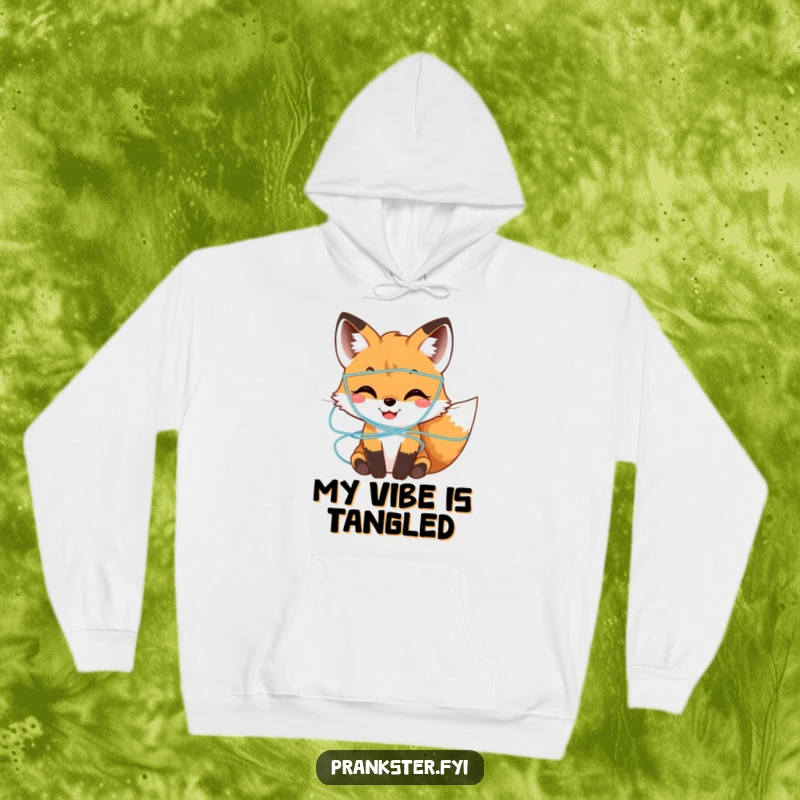 Funny Hoodie showcasing a smiling fox cub covered in colorful, harmless silly string, offering warmth and playful charm.