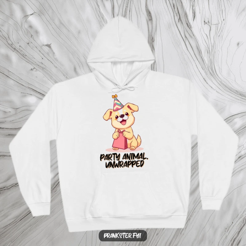 Funny hoodie depicting a playful dog with a party hat shaking a gift bag, symbolizing joyous anticipation.