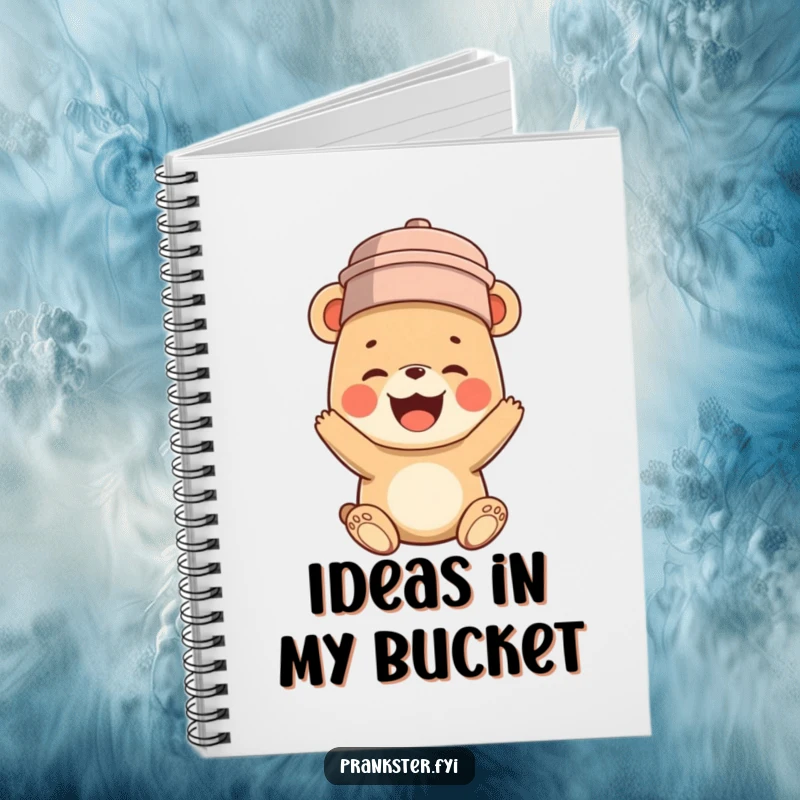 Funny notebook cover with a bear cub humorously wearing a bucket on its head, captured mid-hilarious, infectious giggle.
