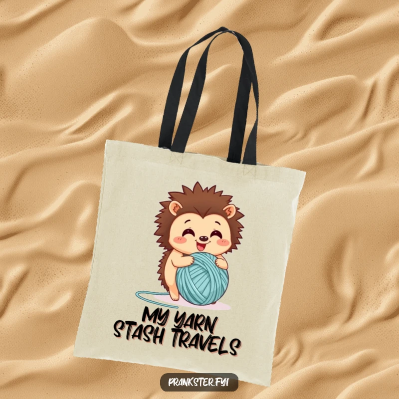 Funny tote bag showcasing a happy hedgehog rolling a large ball of yarn, perfect for carrying crafts and smiles.