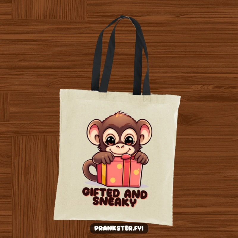 Funny tote bag featuring a mischievous monkey hiding behind a gift box, perfect for shopping trips and carrying humor.